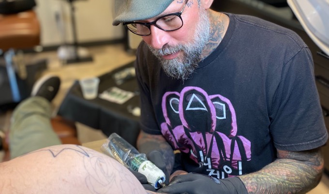 Tattoo artist Jason Ackerman