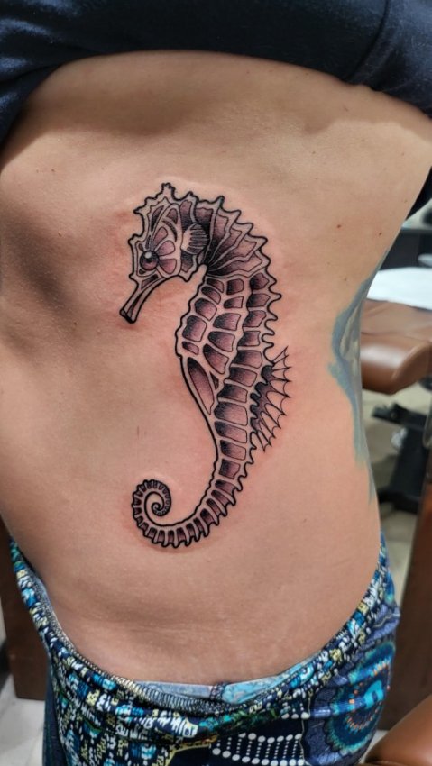 Kelly's seahorse tattoo from Stephanie James