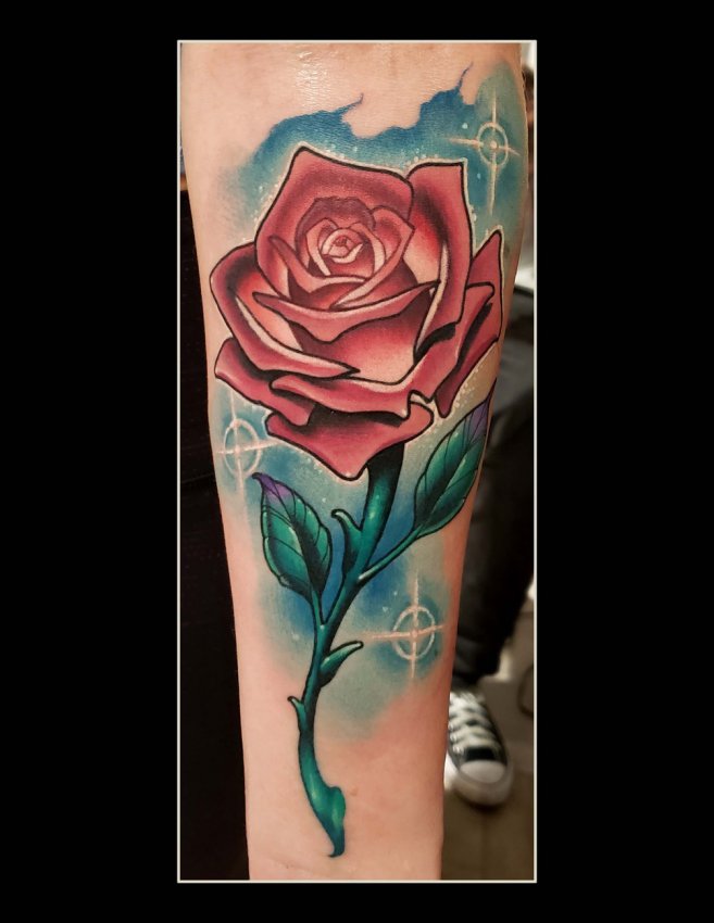 rose vine tattoo designs on the leg
